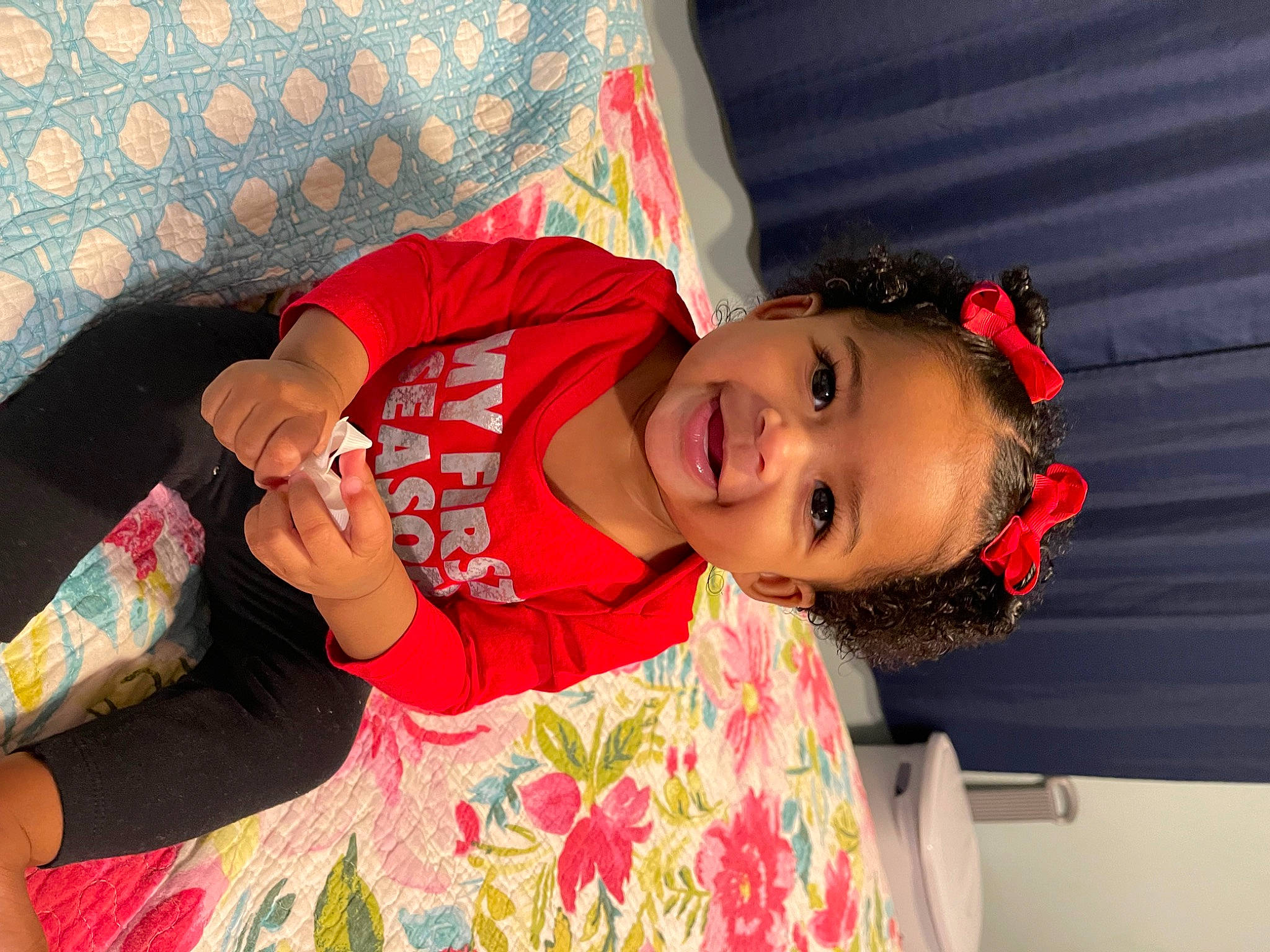 Ailani is registered to the contest to win money with this photo: child, couch, event, fun, happy, hat, joy, leisure, linens, magenta, orange, party, pattern, person, pink, room, skin, sleeve, smile, toddler