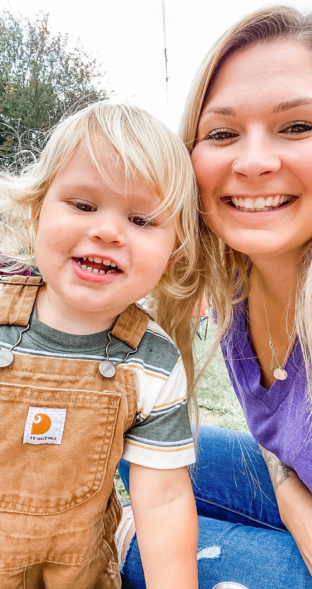 Landon is registered to the contest to win money with this photo: cheek, chin, clothing, eye, facial_expression, gesture, hairstyle, happy, head, human, iris, joy, mammal, nose, organ, people_in_nature, person, skin, sleeve, smile