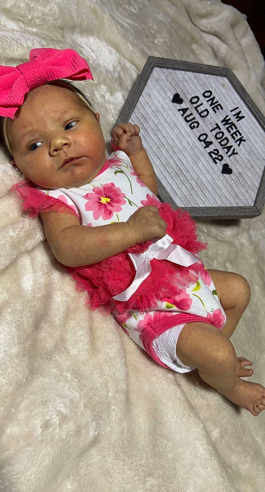 Jaslynn joined the competition — help win amazing prizes! baby, baby_toddler_clothing, book, cheek, child, comfort, eye, facial_expression, finger, hand, happy, lip, magenta, mouth, organ, person, pink, publication, skin, thigh