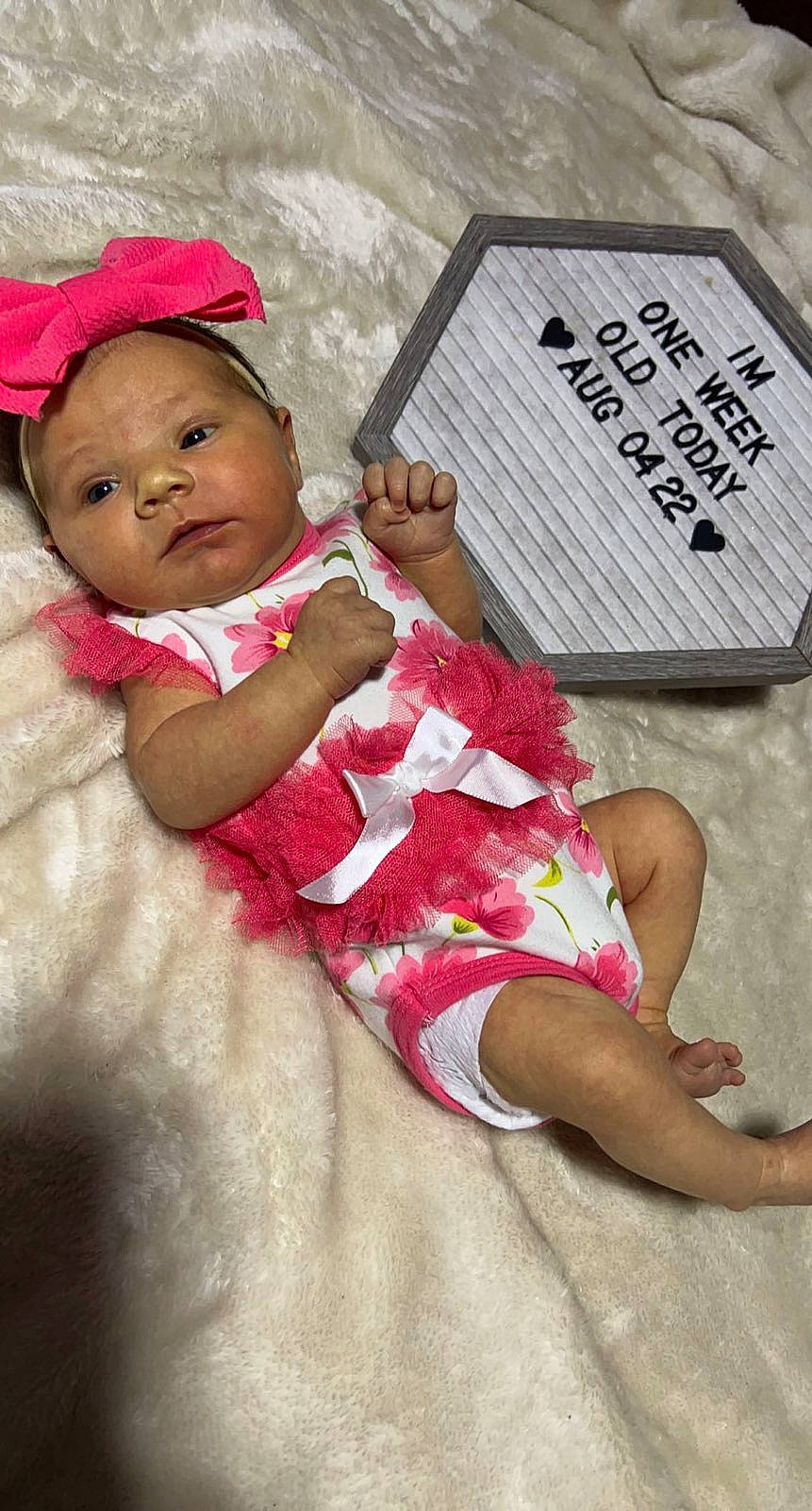 Jaslynn joined the competition — help win amazing prizes! baby, baby_toddler_clothing, beauty, book, child, comfort, face, finger, hand, happy, human_leg, linens, magenta, mammal, person, pink, publication, skin, thigh, toddler