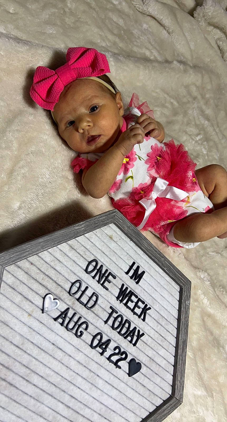 Jaslynn joined the competition — help win amazing prizes! baby, baby_products, baby_toddler_clothing, bedding, child, comfort, event, font, fun, happy, headwear, linens, magenta, person, photo_caption, pink, play, portrait_photography, room, smile