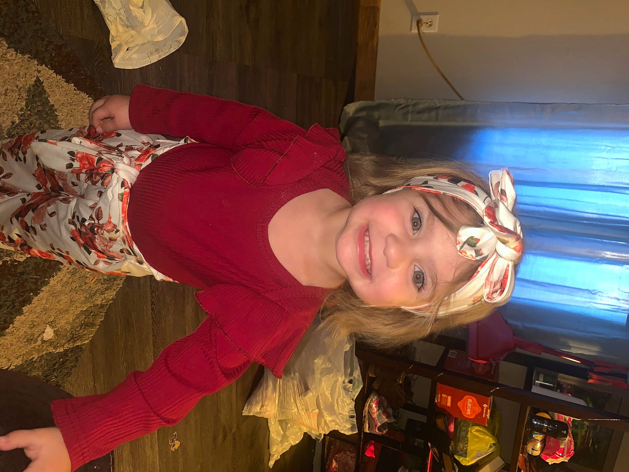 Brynleigh is registered to the contest to win money with this photo: child, costume, event, flash_photography, flesh, fun, happy, headwear, holiday, human_leg, joy, lap, machine, pattern, person, room, smile, thigh, wood