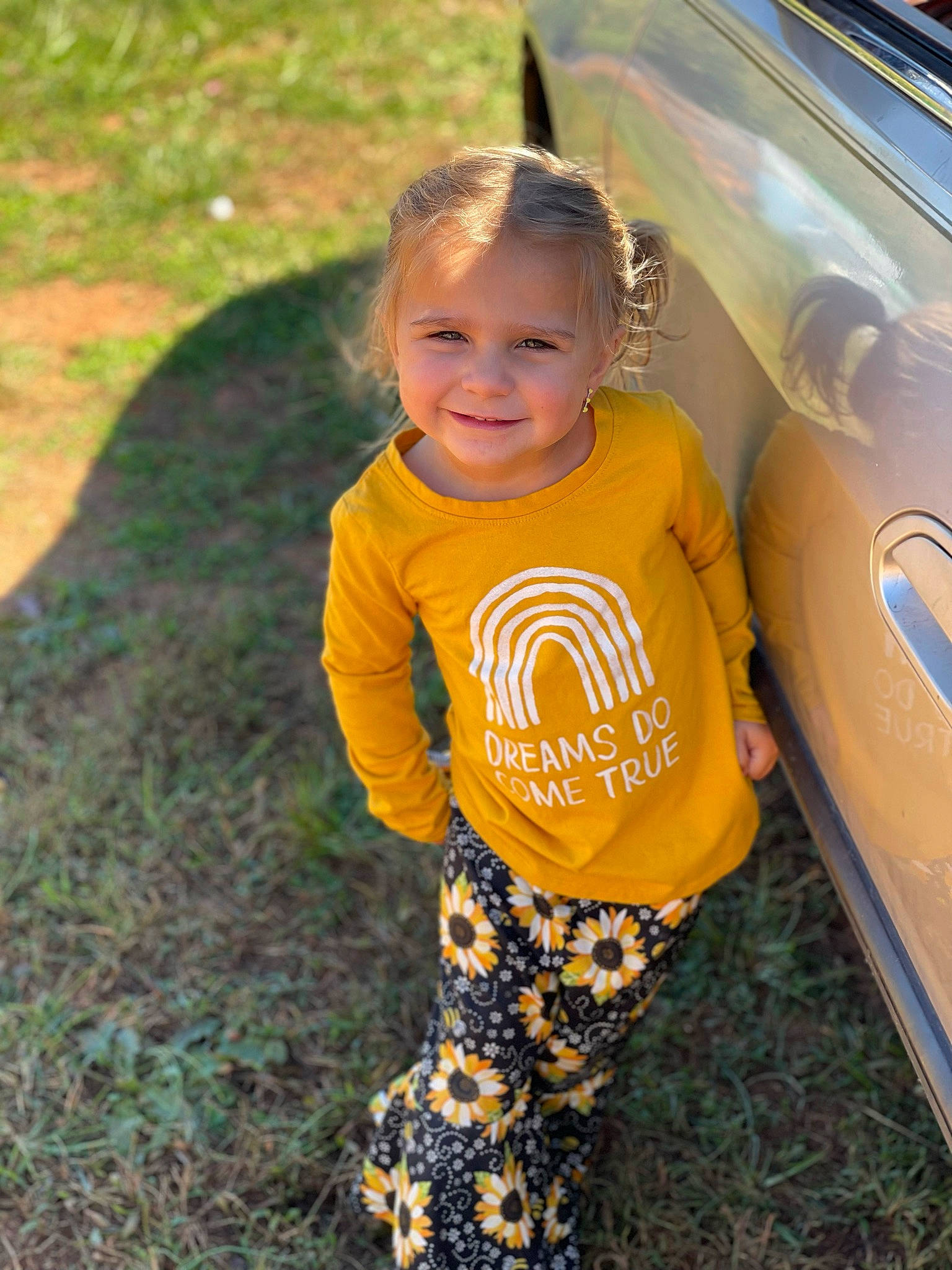 Brynleigh joined the competition — help win amazing prizes! automotive_design, automotive_lighting, automotive_tire, baby_toddler_clothing, bumper, clothing, eye, fun, grass, happy, hood, joy, leisure, motor_vehicle, people_in_nature, person, sleeve, smile, t_shirt, toddler