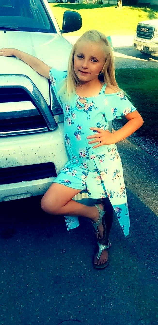 Raelynn is registered to the contest to win money with this photo: aqua, automotive_design, car, cool, day_dress, dress, electric_blue, fashion_design, flash_photography, happy, joy, person, photograph, sandal, shoe, shoulder, summer, textile, thigh, tints_and_shades