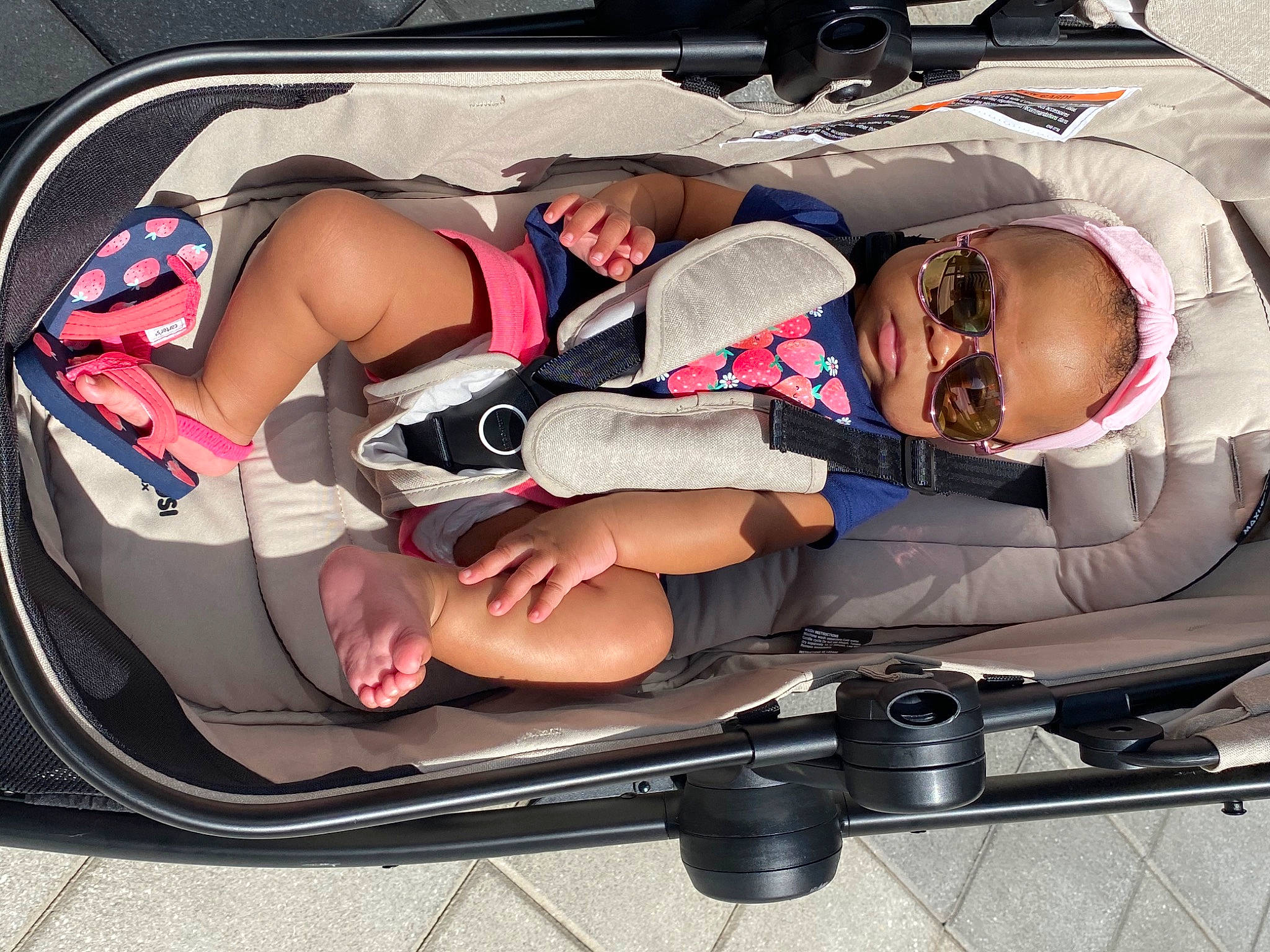 Raelyn is registered to the contest to win money with this photo: auto_part, automotive_design, automotive_exterior, baby_products, car, car_seat, carmine, comfort, family_car, knee, lap, luxury_vehicle, motor_vehicle, person, personal_luxury_car, recreation, smile, thigh, toddler, vehicle