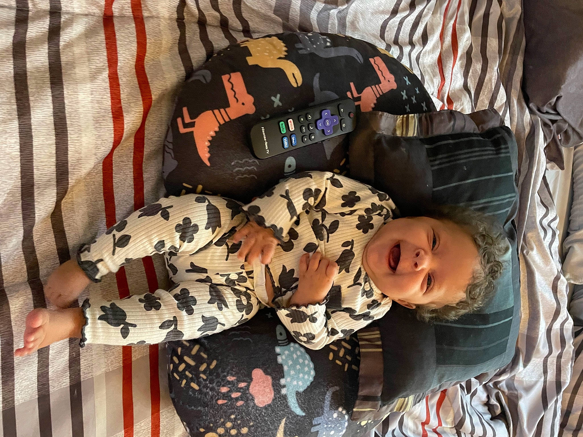 Alayah joined the competition — help win amazing prizes! baby, baby_products, baby_safety, baby_toddler_clothing, bag, camouflage, child, comfort, linens, luggage_and_bags, military_camouflage, pattern, person, plaid, room, sleeve, smile, textile, toddler, tree