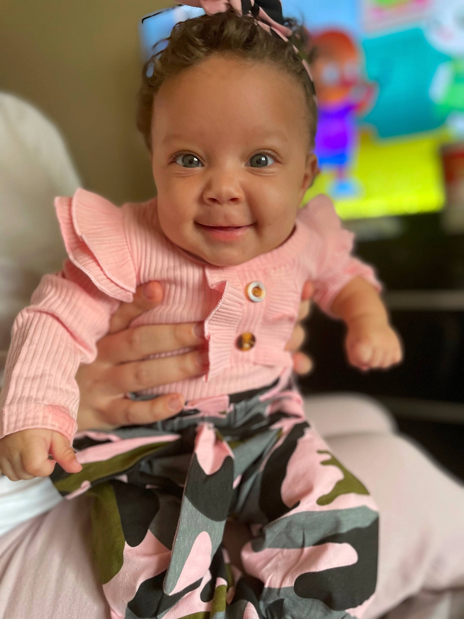 Alayah joined the competition — help win amazing prizes! baby, baby_toddler_clothing, cheek, child, event, eye, facial_expression, finger, fun, gesture, hairstyle, happy, joy, person, pink, room, skin, sleeve, smile, snapshot