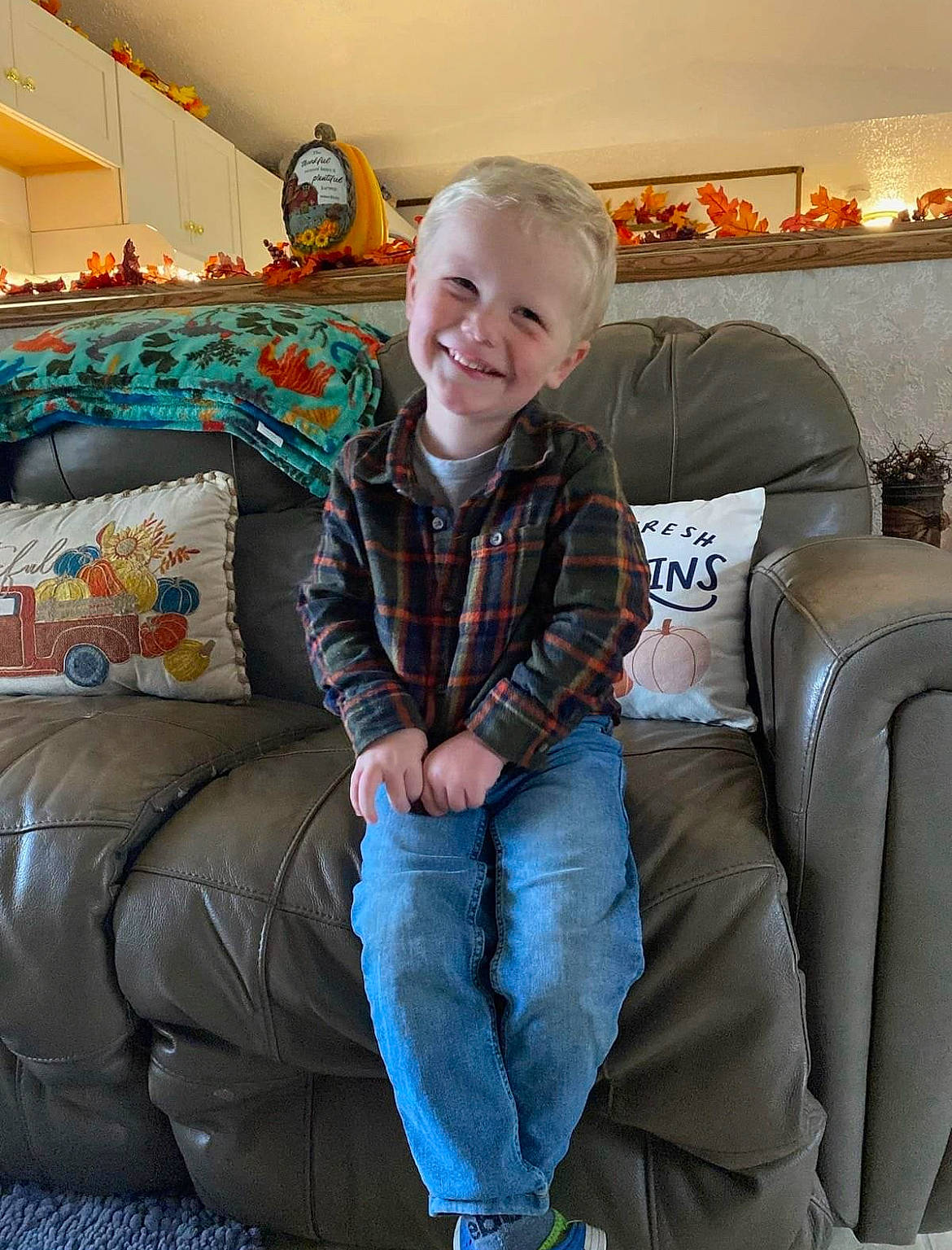 Nicholas joined the competition — help win amazing prizes! comfort, couch, denim, electric_blue, flash_photography, fun, happy, joy, lap, laugh, leg, leisure, living_room, luxury_vehicle, people, person, portrait_photography, room, sitting, smile