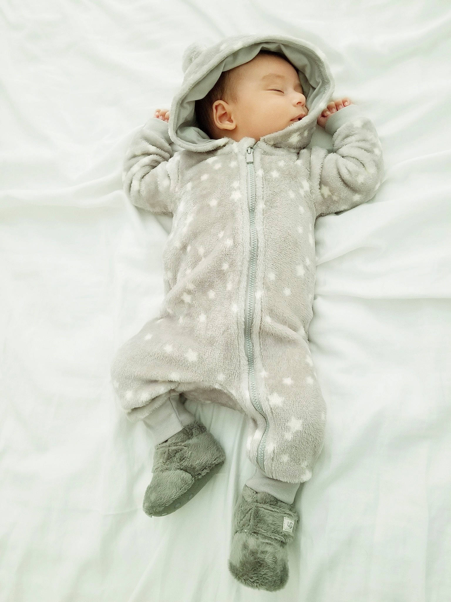 Leonardo Di Sebastian is registered to the contest to win money with this photo: baby, child, outerwear, person, toddler, white