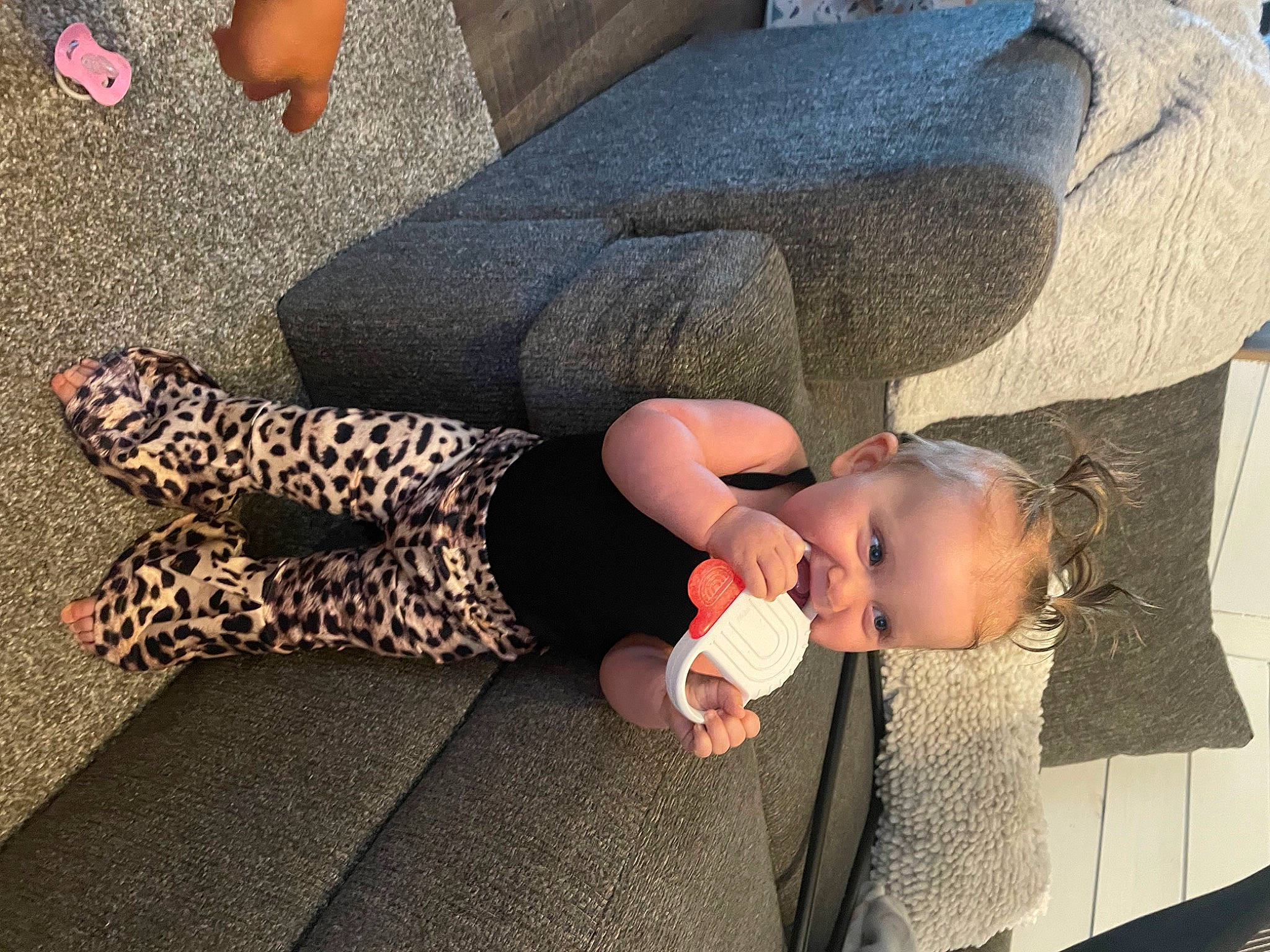Reese joined the competition — help win amazing prizes! baby, baby_toddler_clothing, barefoot, child, comfort, finger, flooring, foot, human, human_body, human_leg, joint, knee, leg, person, road_surface, sitting, sleeve, sock, thigh