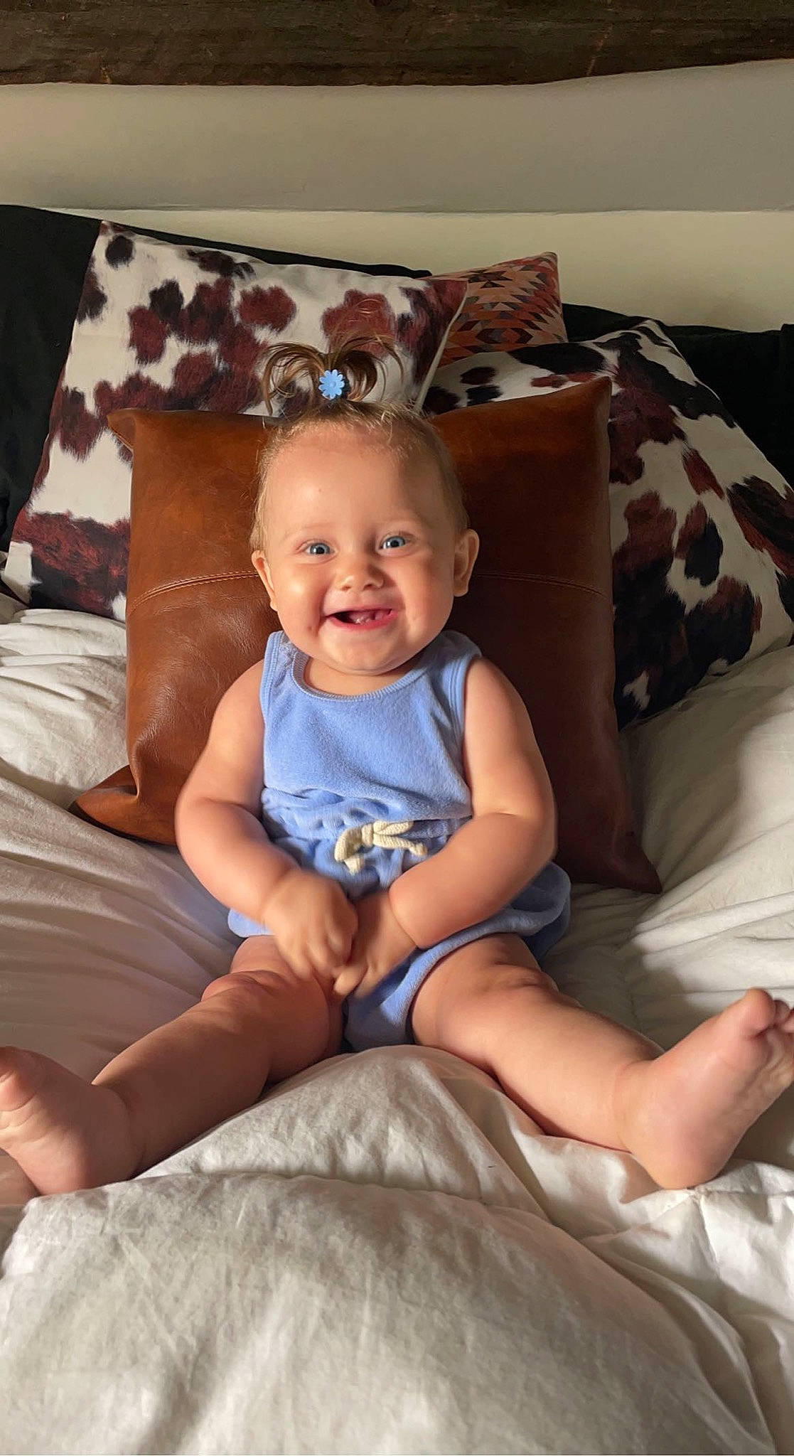 Reese joined the competition — help win amazing prizes! baby, baby_toddler_clothing, barefoot, child, comfort, couch, eye, fun, happy, human_leg, joy, lap, linens, living_room, person, room, sitting, skin, smile, thigh
