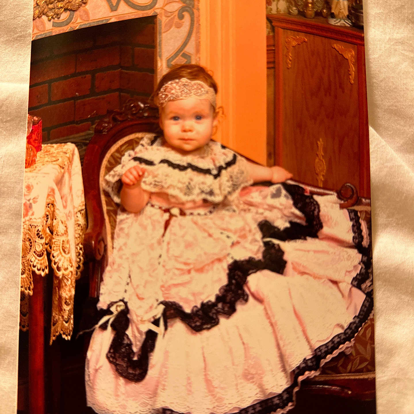 Anna joined the competition — help win amazing prizes! baby, clothing, costume, dress, eveningdress, face, fashion, fireplace, formalwear, furniture, gown, hardwood, hat, head, indoors, lace, person, photography, portrait, wood