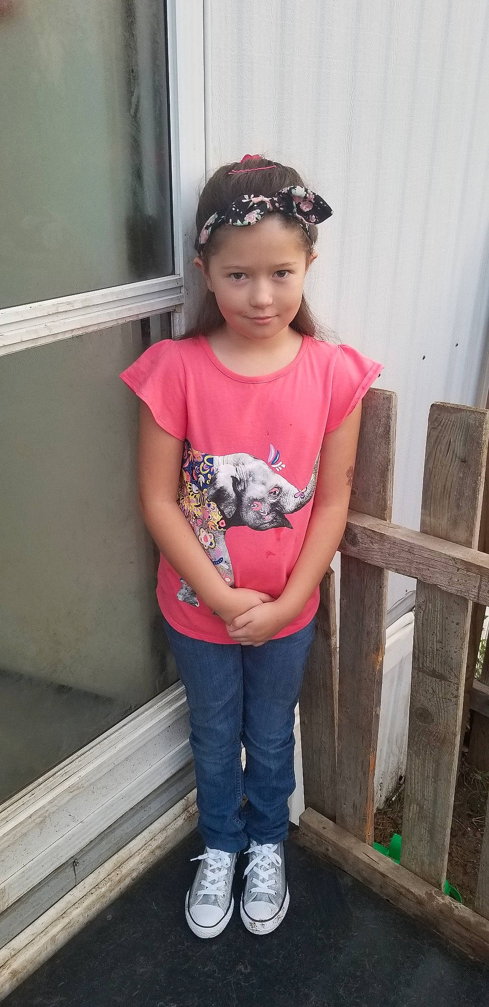 Kalie is registered to the contest to win money with this photo: child, child_model, headband, person, pink, smile, t_shirt, toddler