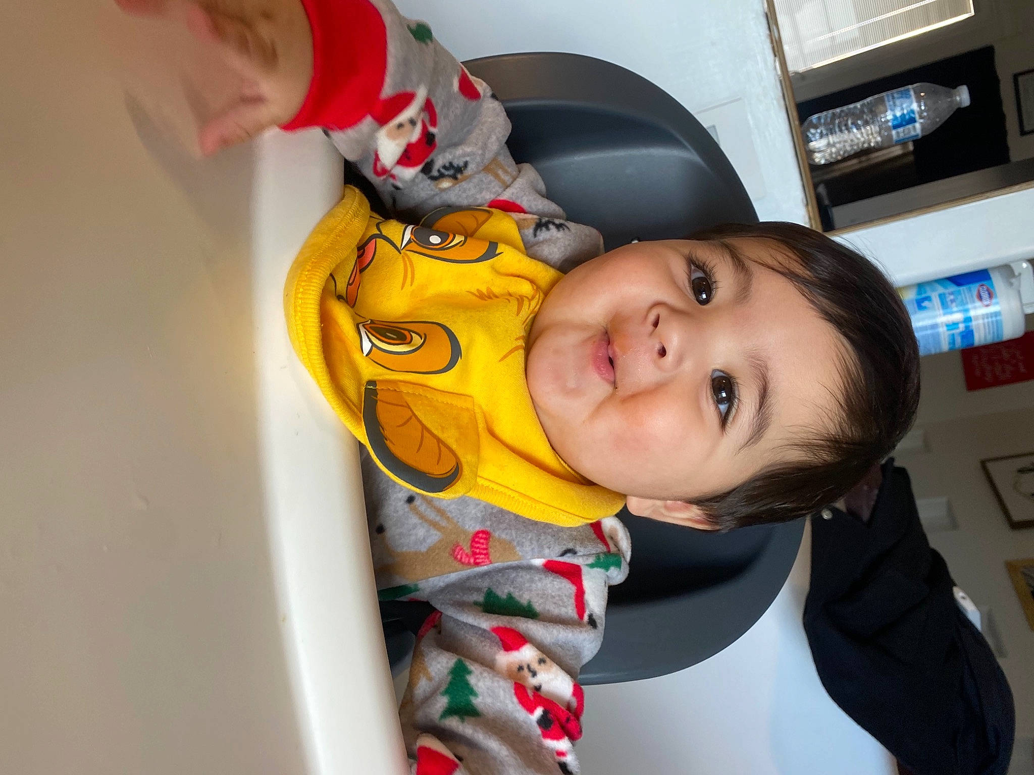 Jesus is registered to the contest to win money with this photo: baby, baby_carriage, baby_products, baby_toddler_clothing, car_seat, carmine, chair, cheek, child, comfort, eyebrow, fun, happy, mouth, nose, person, room, skin, smile, toddler