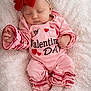baby, blanket, closeup, cozy, cute, hand, headband, hearts, infant, newborn, peaceful, pink_onesie, portrait, red_bow, ruffles, sleeping, sleeping_baby, sock, soft_texture, valentine_text