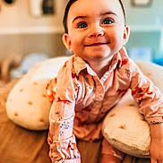 Nezuko joined the competition — help win amazing prizes! baby, bed, child, cute, eyes, face, hair, happy, home, indoors, infant, patterned_clothing, person, pillow, portrait, shirt, skin, smiling, toddler, young_child