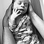 newborn, baby, infant, sleeping, hands, cradled, blanket, patterned_blanket, black_and_white, portrait, peaceful, close_up, skin, wrapped, toddler, human, resting, soft, gentle, infancy