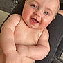 Nahël participe au concours pour gagner de l'argent avec cette photo : arms, baby, cheeks, child, closeup, cute, diaper, expression, face, furniture, happy, human, indoors, infant, legs, person, playful, sitting, skin, smiling