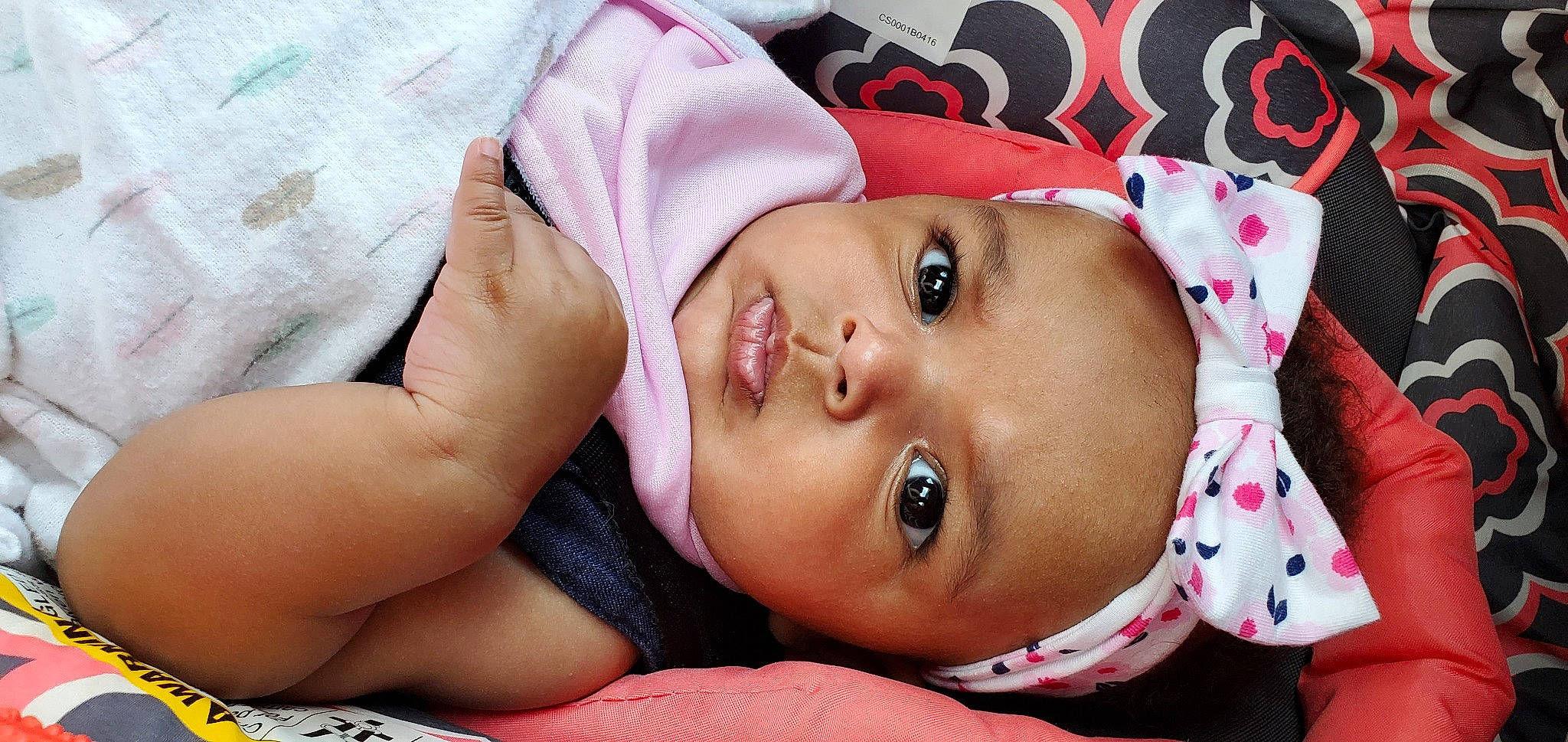 Avianna joined the competition — help win amazing prizes! baby, cheek, child, close_up, ear, eye, eyebrow, face, finger, head, lip, mouth, nose, person, pink, skin, toddler