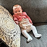 baby, child, girl, smile, couch, pillow, headband, cardigan, dress, tights, indoor, cute, infant, happy, portrait, fabric, texture, relaxing, seated, home