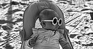 Mckinley is registered to the contest to win money with this photo: baby, sunglasses, beach, sand, chair, swimsuit, child, sunny, outdoor, relaxing, summer, portrait, infant, seat, shade, cute, fashion, vacation, monochrome, sunshine