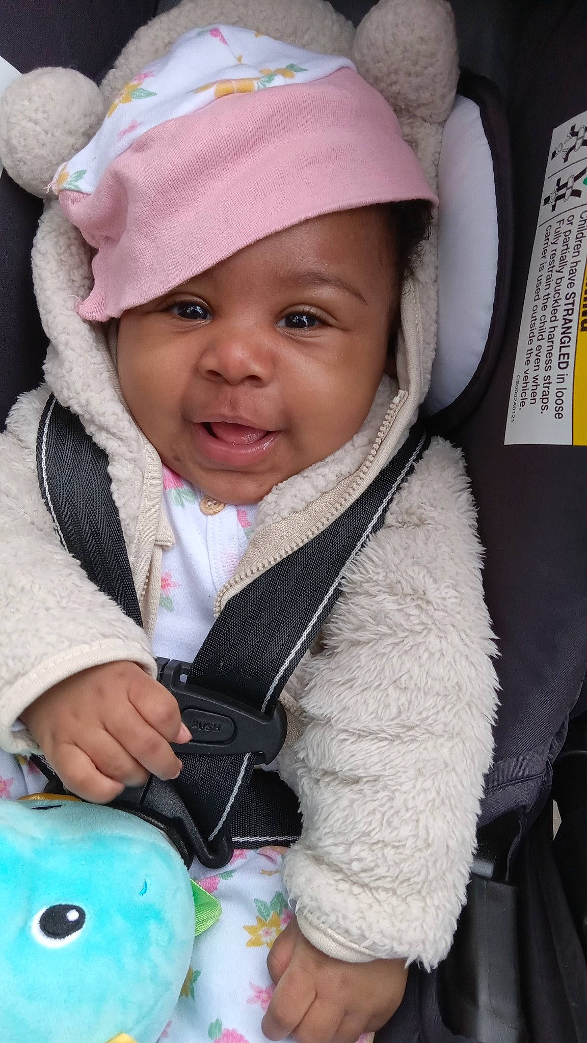 Mylee joined the competition — help win amazing prizes! baby, cap, cheek, happy, head, headwear, iris, jacket, lip, mouth, nose, organ, outerwear, people, person, pink, skin, smile, textile, toddler