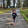 Alyia joined the competition — help win amazing prizes! child, running, outdoor, forest, trees, dirt_road, puddles, grass, person, adidas, tracksuit, pink_shoes, daylight, nature, play, happy, casual_clothing, path, background, recreation