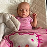 Paige joined the competition — help win amazing prizes! baby, sleeping, blanket, hello_kitty, pink, quilted, mattress, infant, child, peaceful, clothing, indoors, cute, resting, person, portrait, newborn, soft, wrapped, bed