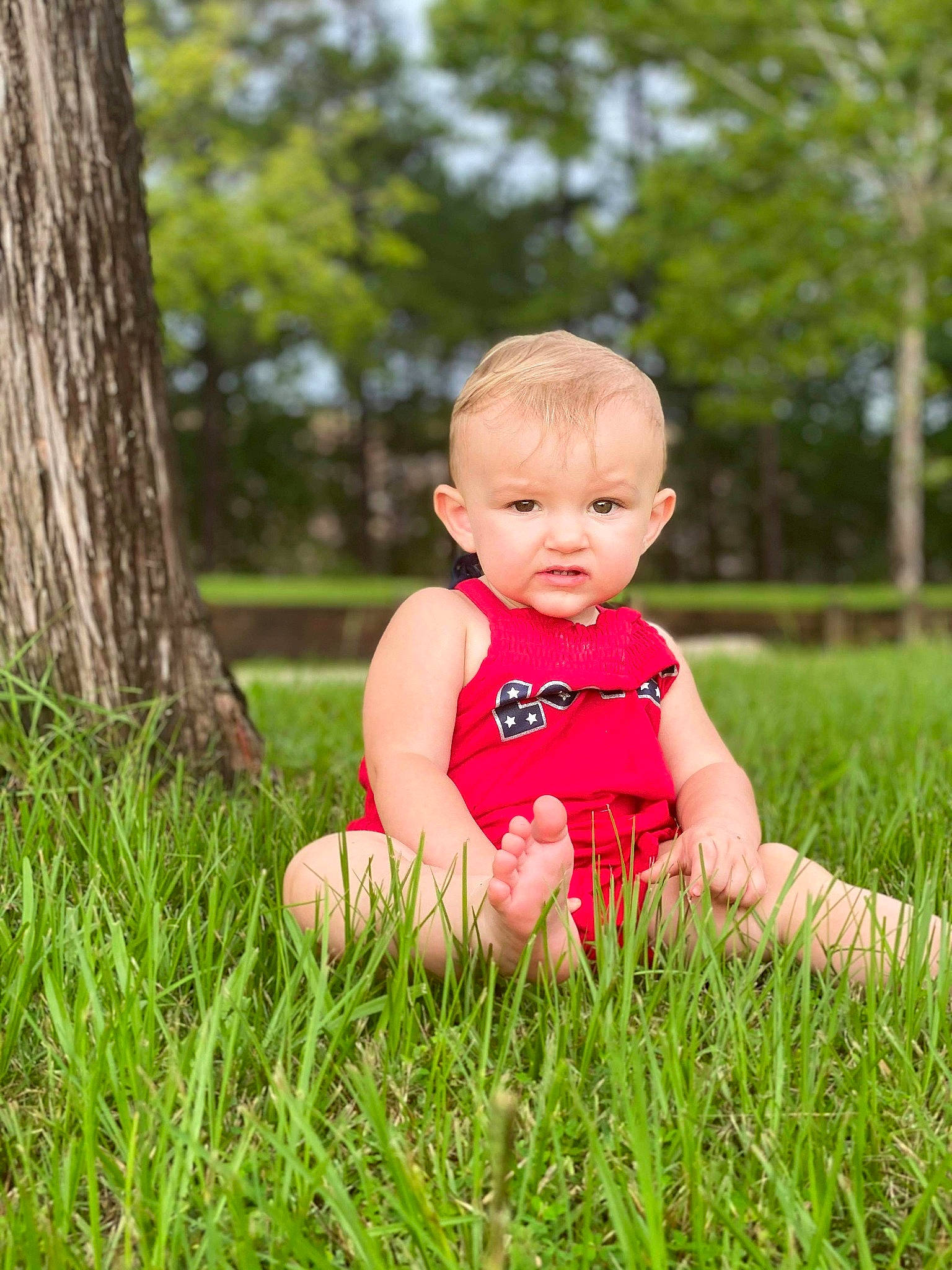 Zoey is registered to the contest to win money with this photo: baby, child, grass, grass_family, grassland, green, happy, lawn, meadow, people_in_nature, person, photograph, photography, pink, plant, play, sitting, skin, smile, summer