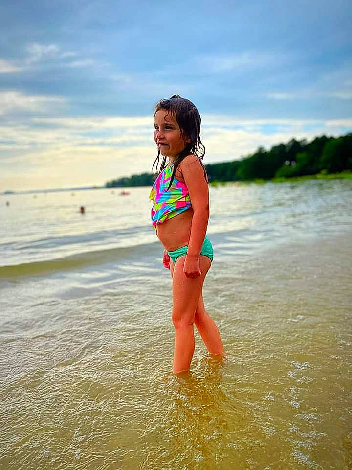 Annabella is registered to the contest to win money with this photo: beach, beauty, bikini, child, coast, fun, happy, long_hair, ocean, person, photography, sand, sea, shore, summer, swimwear, tide, toddler, vacation, water
