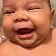 Liam is registered to the contest to win money with this photo: baby, close_up, smile, happy, face, skin, infant, child, teeth, mouth, cheeks, eyes, head, person, expression, human, cute, joy, newborn, portrait