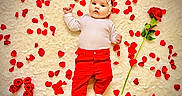 Maëly participe au concours pour gagner de l'argent avec cette photo : baby, baby_clothing, celebration, child, cute, decorative, flower, fluffy_blanket, happy, headband, indoors, infant, lying_down, milestone, portrait, red_color, red_pants, rose_petals, soft_texture, white_top
