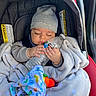 baby, blanket, bundle, car_seat, child, closeup, clothing, comfort, cute, hat, indoor, infant, nap, peaceful, resting, seatbelt, sleeping, soft, toy, water_bottle