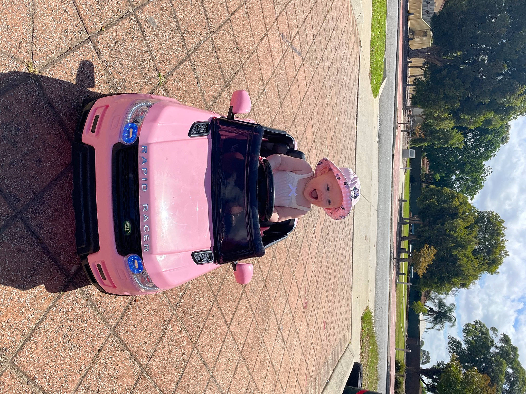 Nevaeh is registered to the contest to win money with this photo: auto_part, automotive_design, automotive_exterior, automotive_lighting, automotive_tire, automotive_wheel_system, bumper, car, cloud, family_car, headwear, line, motor_vehicle, person, sky, tints_and_shades, tire, tree, vehicle, vehicle_door