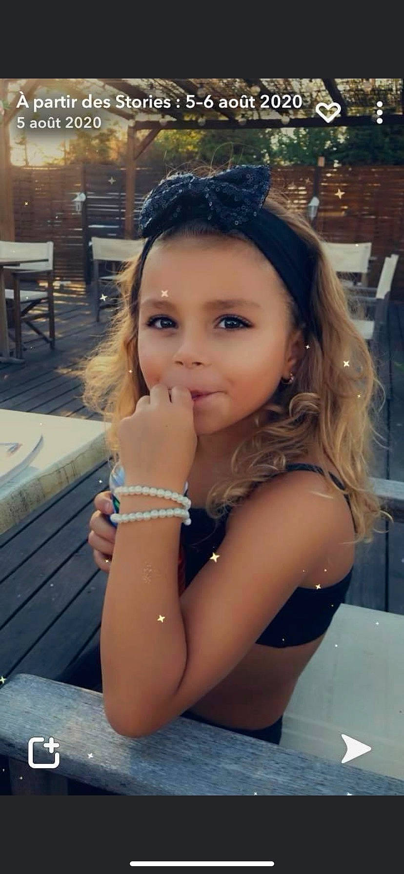 Aaliyah participe au concours pour gagner de l'argent avec cette photo : black_hair, brown_hair, child, electric_blue, eyebrow, eyelash, fashion_accessory, flash_photography, fun, grass, happy, human_leg, jewellery, leisure, lip, long_hair, person, sitting, skin, sunglasses