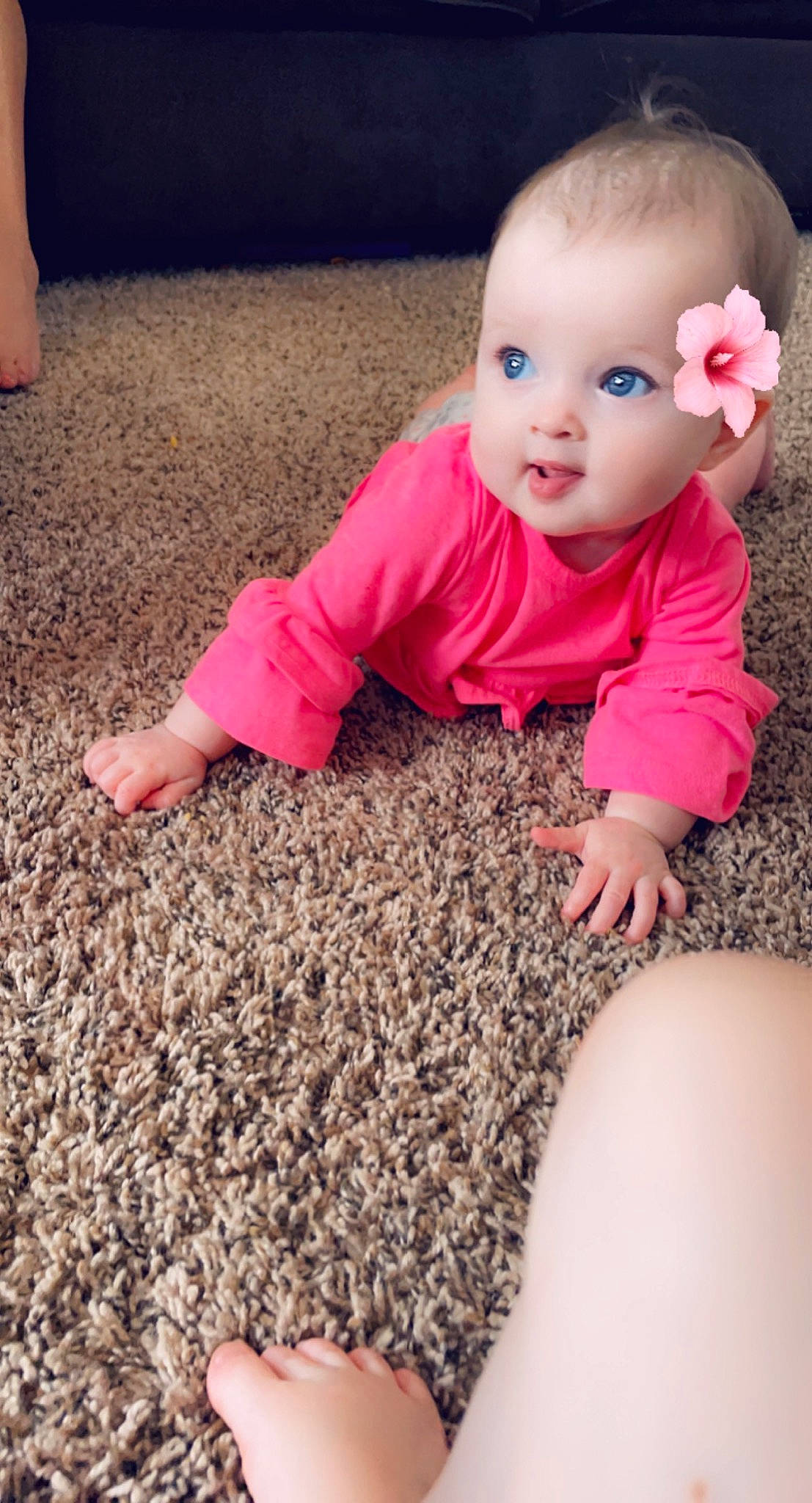 Serenity is registered to the contest to win money with this photo: baby, baby_toddler_clothing, finger, floor, flooring, gesture, grass, hand, happy, leg, mammal, people, person, photograph, pink, red, sleeve, smile, toddler, vertebrate