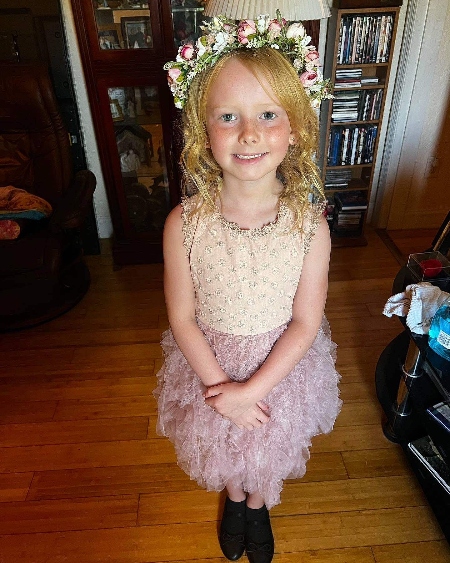 Kayleigh is registered to the contest to win money with this photo: baby_toddler_clothing, blond, child, embellishment, event, floor, flooring, formal_wear, fun, hairstyle, happy, hardwood, headpiece, iris, joy, person, pink, ruffle, skin, smile