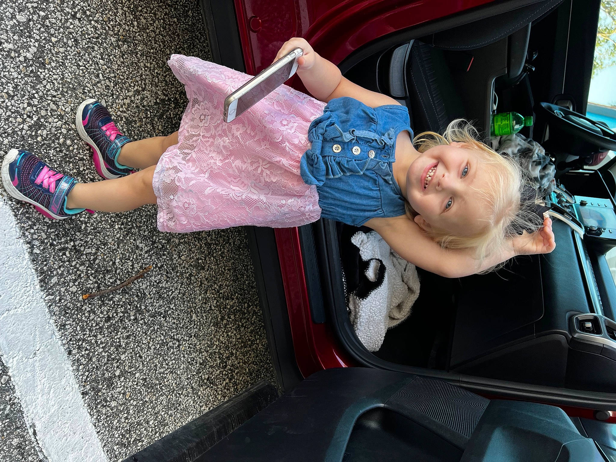 Miyah joined the competition — help win amazing prizes! auto_part, automotive_design, automotive_exterior, automotive_tire, automotive_wheel_system, bumper, car_seat, car_seat_cover, child, family_car, fun, human_leg, joy, motor_vehicle, person, pink, plant, smile, steering_wheel, toddler