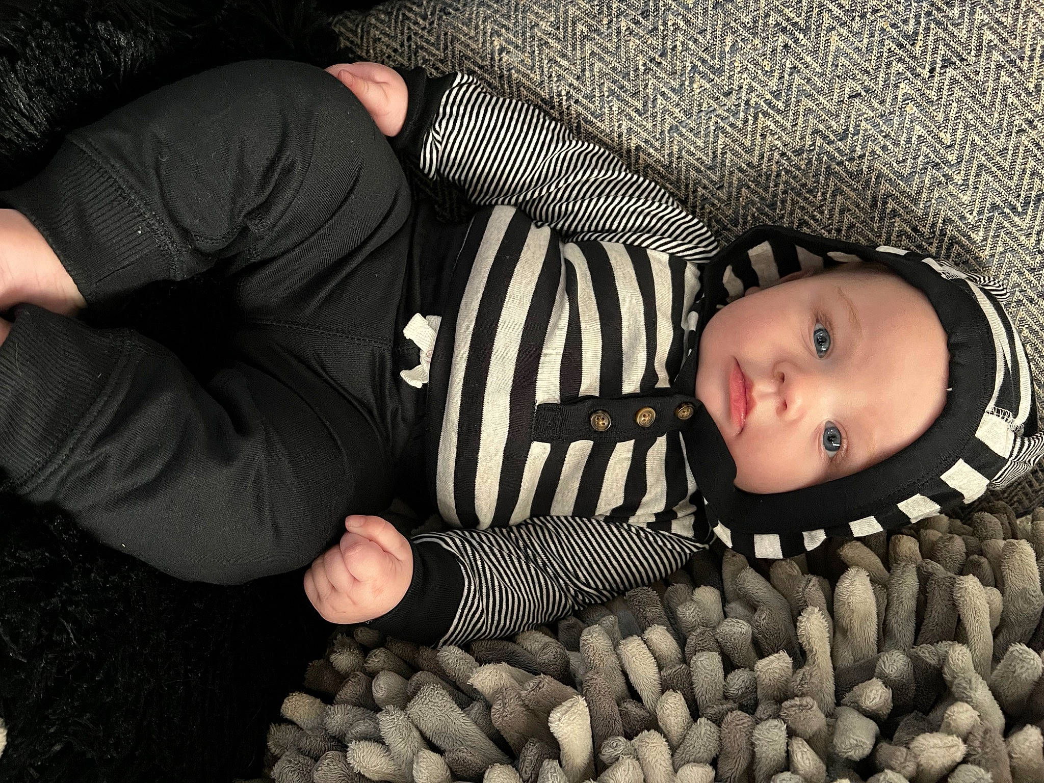 Ryker is registered to the contest to win money with this photo: baby, baby_toddler_clothing, child, comfort, finger, flash_photography, grass, happy, headwear, nail, natural_foods, pattern, people_in_nature, person, portrait_photography, produce, sitting, superfood, thumb, toddler