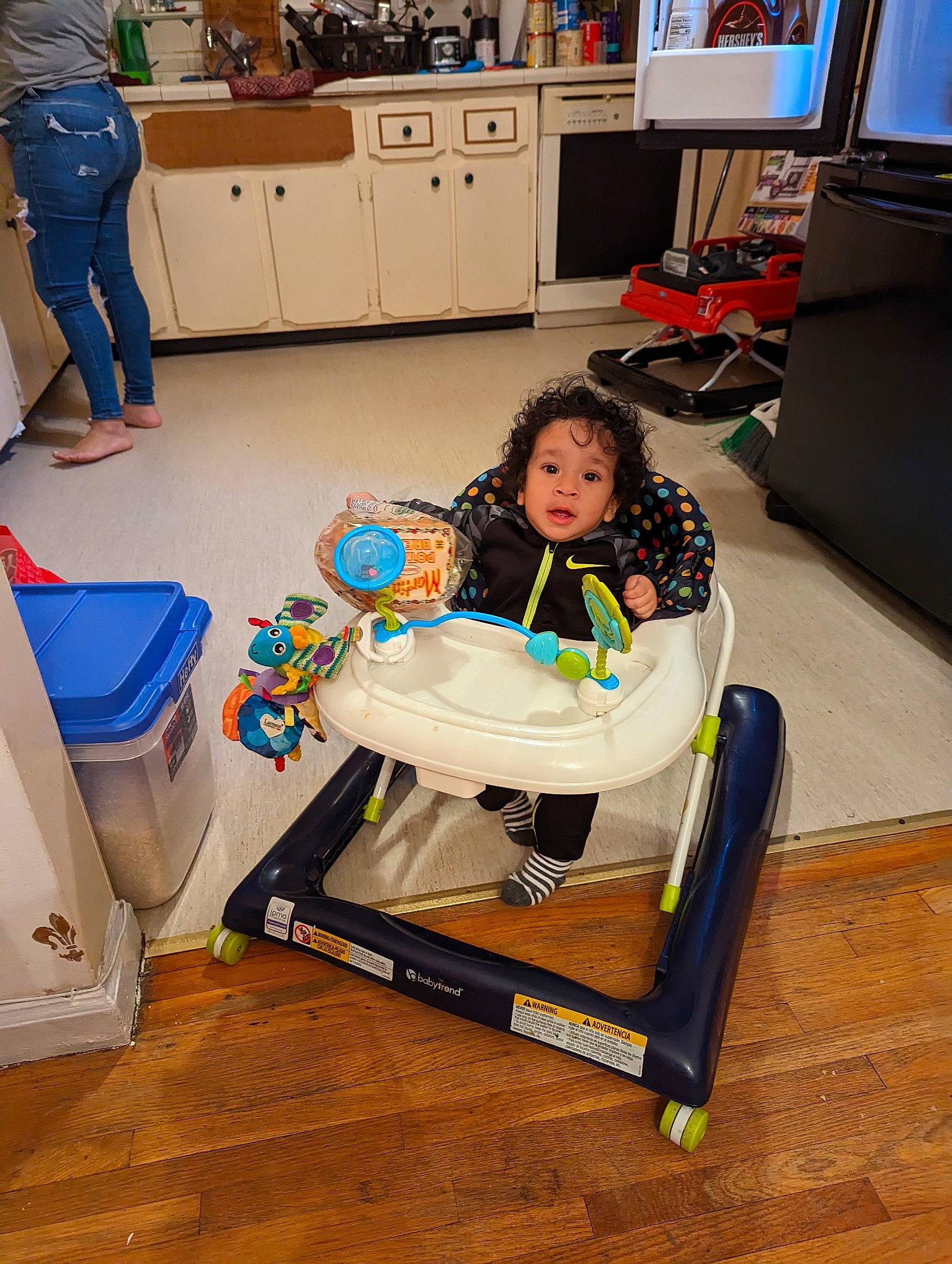 Joshua is registered to the contest to win money with this photo: automotive_design, bag, cabinetry, chair, chest_of_drawers, computer_monitor, desk, drawer, engineering, flooring, furniture, leisure, luggage_and_bags, machine, person, room, shoe, sitting, television, toddler