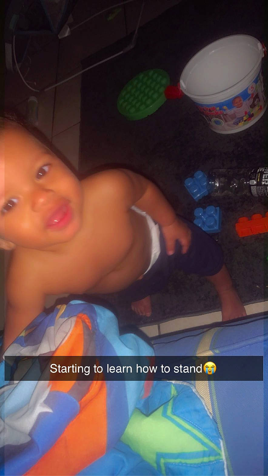 Jay is registered to the contest to win money with this photo: abdomen, arm, bathing, chest, child, cup, electric_blue, eyelash, fun, happy, hat, human_body, leisure, logo, mug, person, photo_caption, t_shirt, thigh, toddler