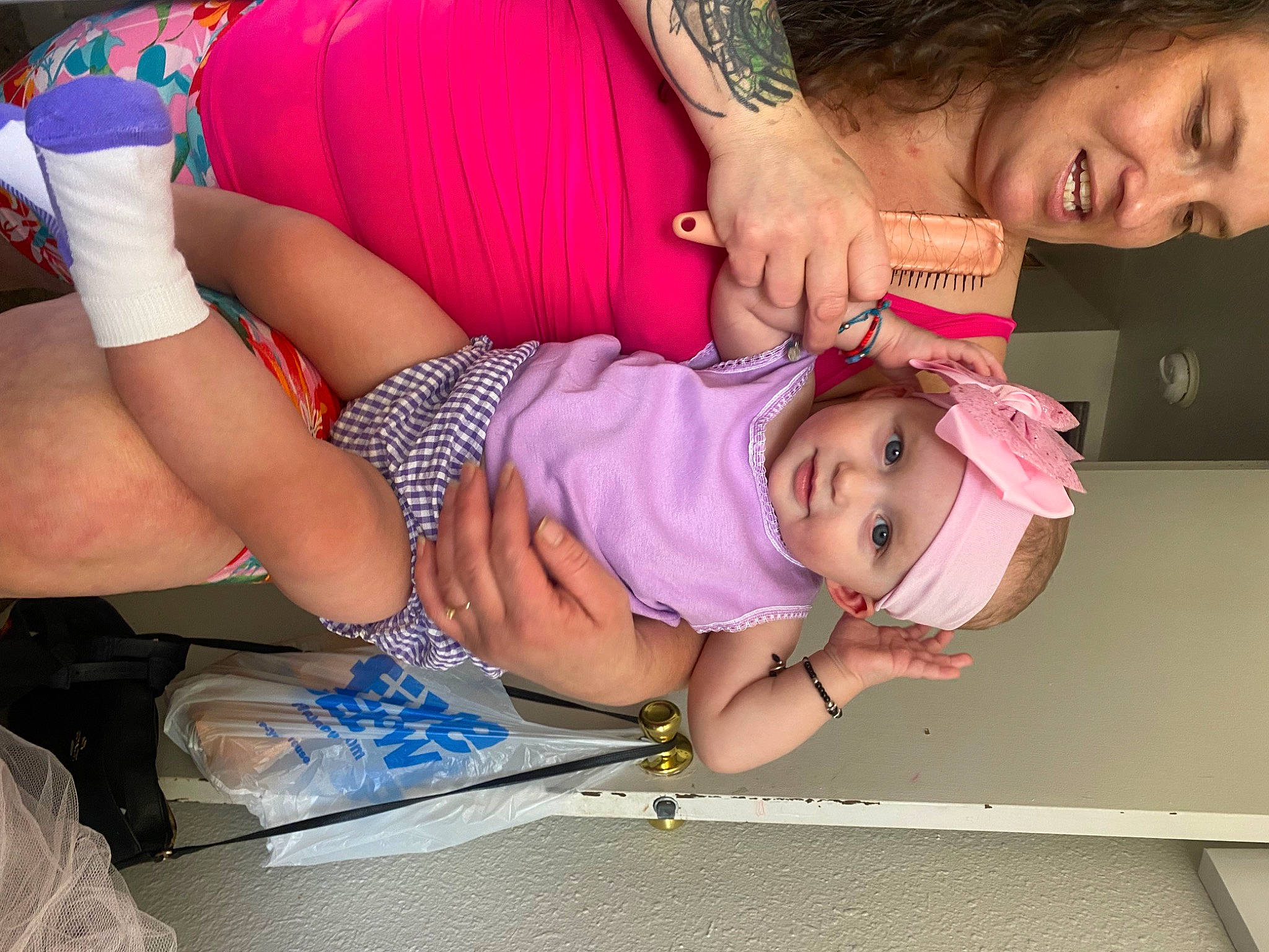 Daisy is registered to the contest to win money with this photo: baby_toddler_clothing, beauty, chest, child, eyelash, face, finger, fun, happy, headwear, human_leg, joy, knee, magenta, mouth, person, pink, shorts, skin, smile