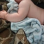 baby, sleeping, blanket, couch, pillow, patterned, soft, child, peaceful, relaxed, indoor, comfort, infant, skin, rest, closeup, young, toddler, nap, cozy