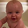 baby, child, smiling, bald, bathtub, water, cup, skin, cute, face, arm, chubby, indoors, portrait, happy, infant, bath, person, young, playful
