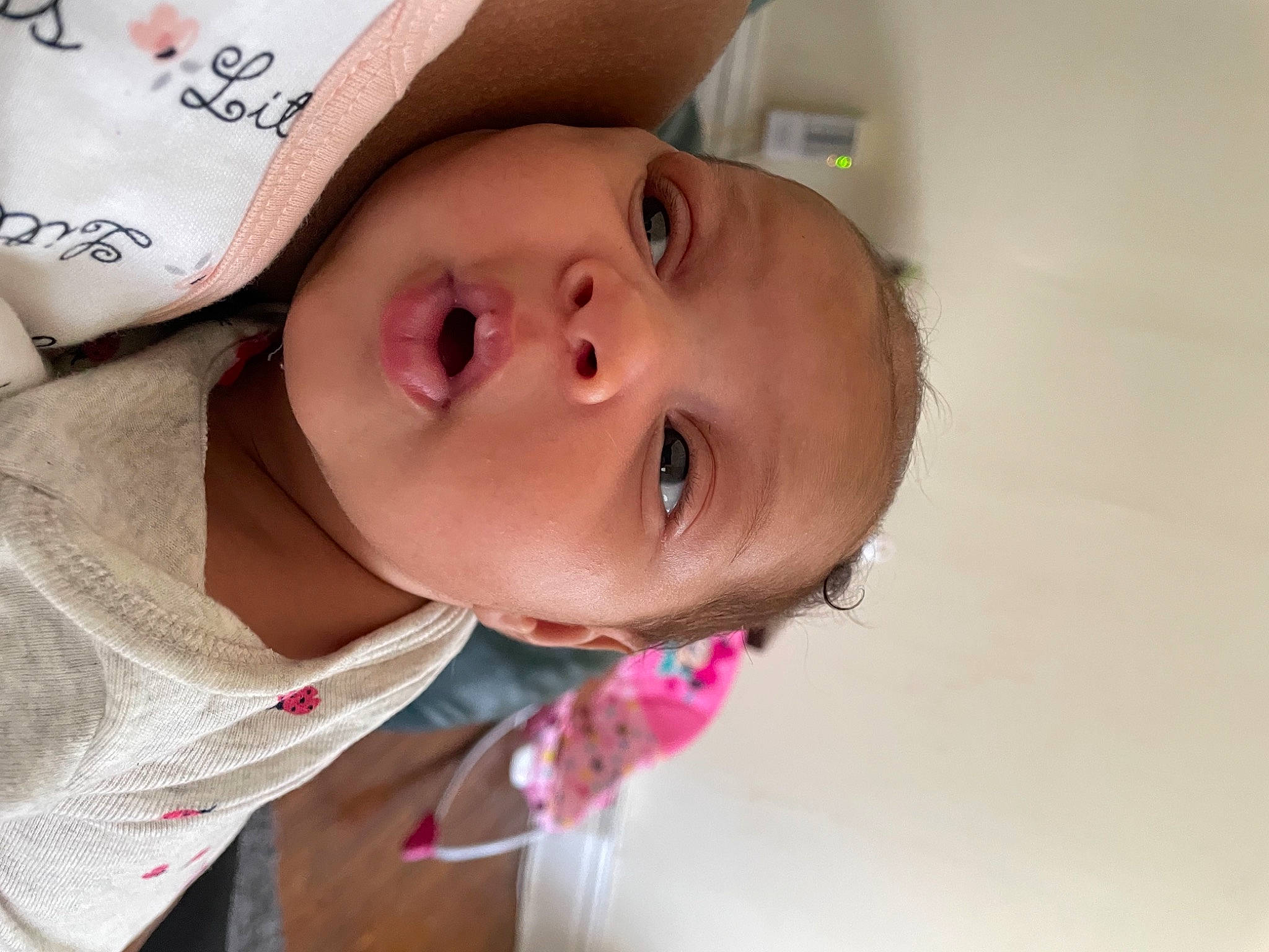Rhea joined the competition — help win amazing prizes! baby, cap, cheek, chin, ear, eyebrow, eyelash, facial_expression, happy, hat, headgear, iris, lip, mouth, nose, person, pink, skin, smile, sun_hat