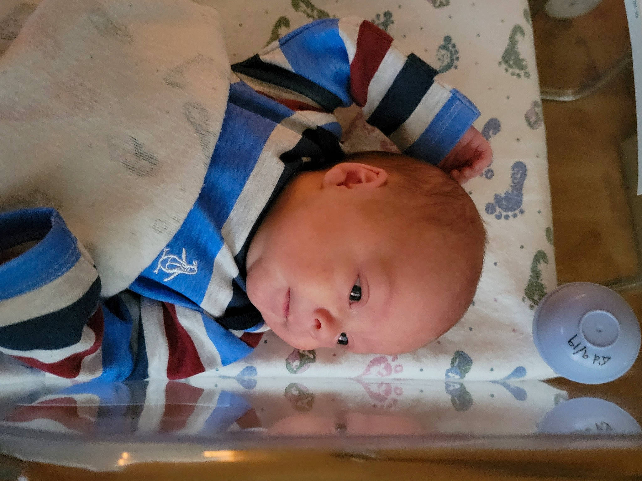 Wyatt is registered to the contest to win money with this photo: baby, baby_products, baby_safety, baby_toddler_clothing, bedtime, cheek, child, comfort, happy, infant_bed, linens, nap, person, room, skin, sleep, smile, textile, toddler, wood