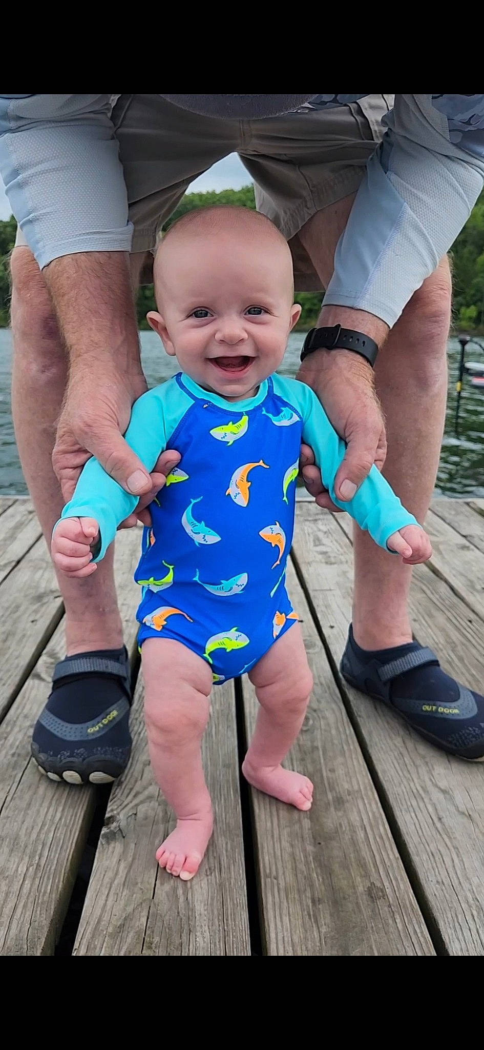 Archer is registered to the contest to win money with this photo: azure, baby, baby_toddler_clothing, child, electric_blue, finger, foot, fun, gesture, happy, human_leg, joint, joy, leisure, people, person, pink, smile, thigh, thumb