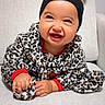 Nasya Ellie joined the competition — help win amazing prizes! baby, chair, child, cushion, eyes, face, furniture, hairstyle, hands, happy, headband, indoor, laughing, leopard_print, outfit, portrait, sitting, smiling, teeth, topknot