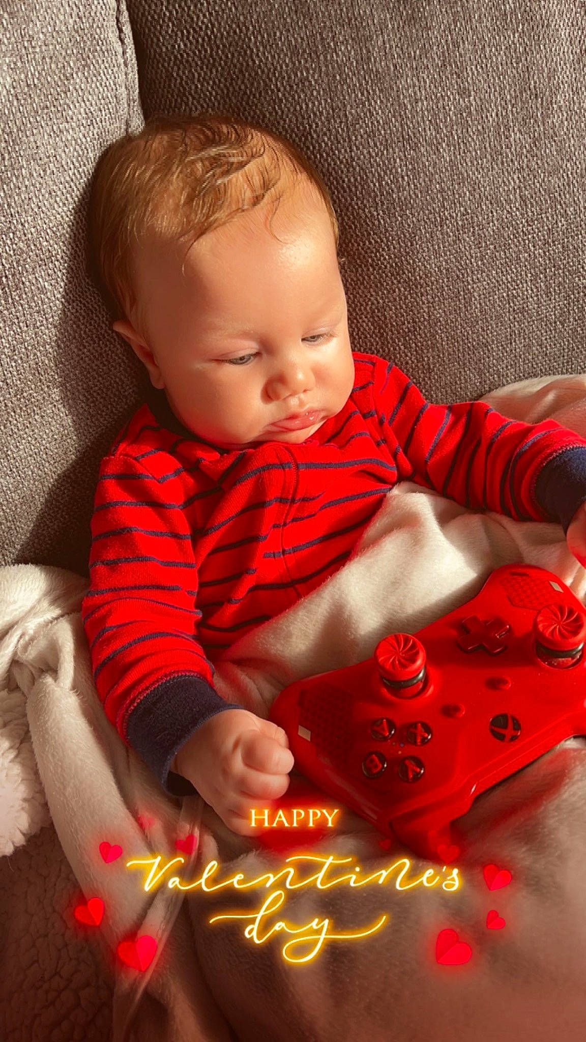 Jayden is registered to the contest to win money with this photo: baby, baby_toddler_clothing, carmine, child, christmas, comfort, event, happy, holiday, linens, orange, pattern, person, plaid, sitting, skin, sleeve, t_shirt, tartan, textile