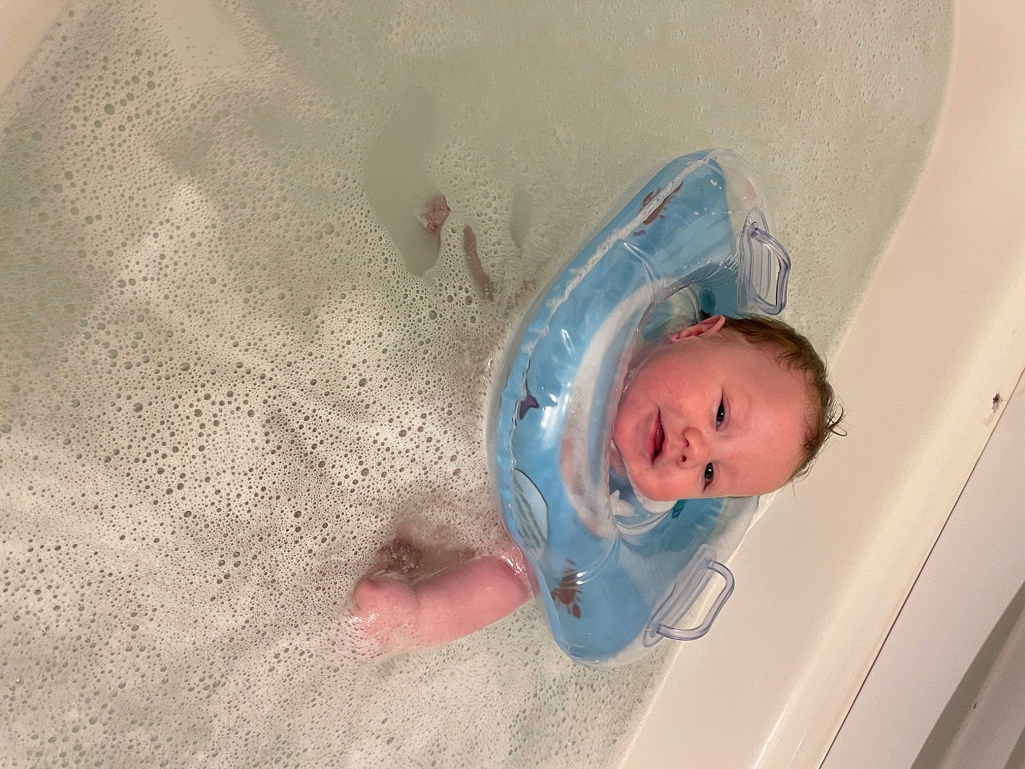 Jayden is registered to the contest to win money with this photo: baby, baby_products, baby_safety, baby_toddler_clothing, bathing, ceiling, child, comfort, flooring, foot, fun, human_body, infant_bed, leg, linens, person, plaster, room, thumb, toddler